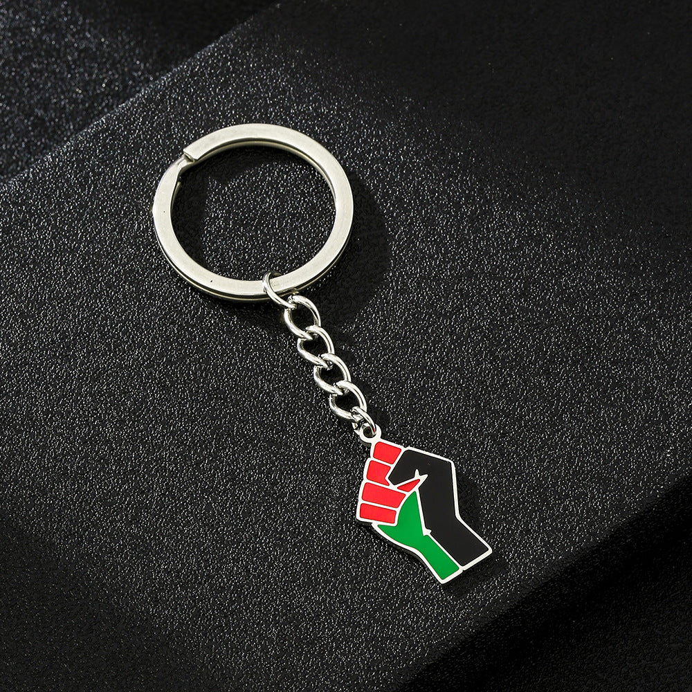 Accessorio pendente portachiavi in acciaio al titanio a forma di pugno in stile etnico per uomo e donna