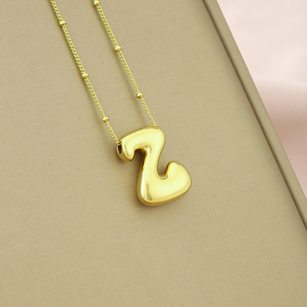 Collana girocollo minimalista da donna con ciondolo a lettera in rame placcato, catenina delicata