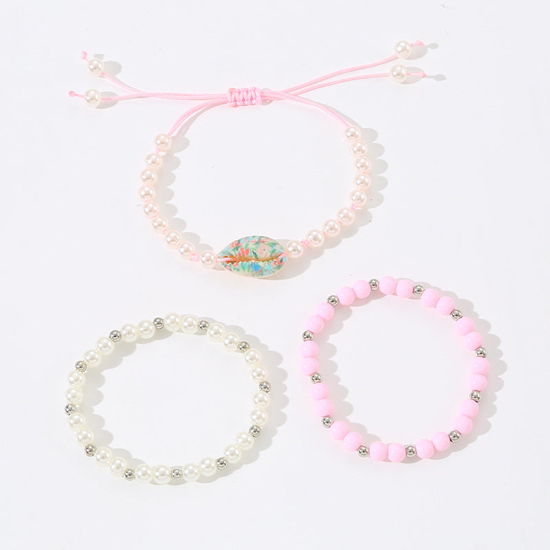 Minimalist Geometric Shell and Acrylic Beaded Bracelet Set for Children with Pink Pearlescent Finish