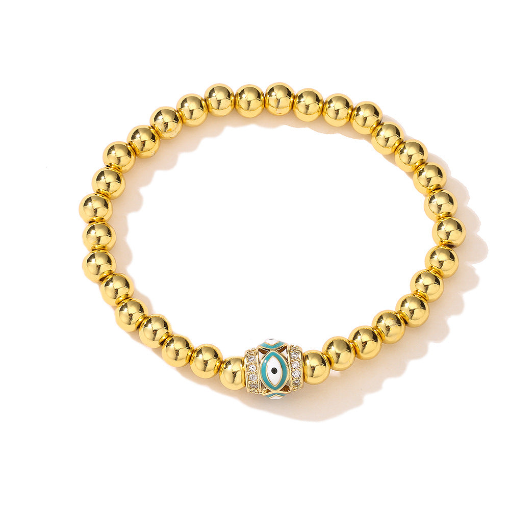 Bracciale sottile da donna geometrico minimalista con amuleto dell'occhio di Allah, base in rame placcato oro 18 carati e zirconia incastonata con smalto