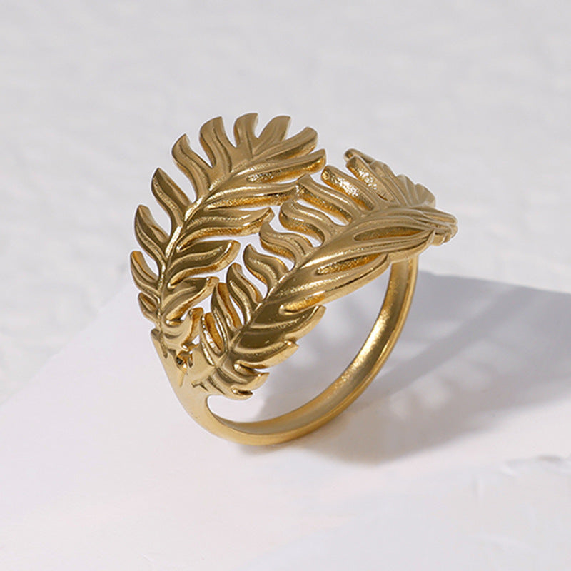 Anello da donna minimalista a forma di foglia in acciaio inossidabile con finitura placcata, fascia aperta regolabile