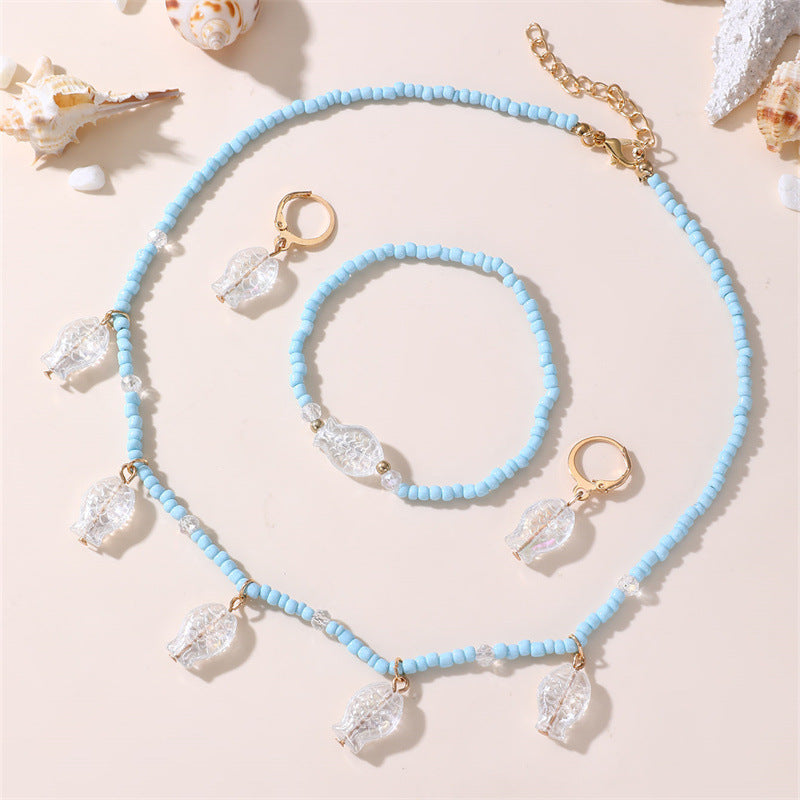 Set Collana con Fiocco Minimalista Blu Perla per Bambini con Bracciale Abbinato, Orecchini a Clip e Anello in Resina