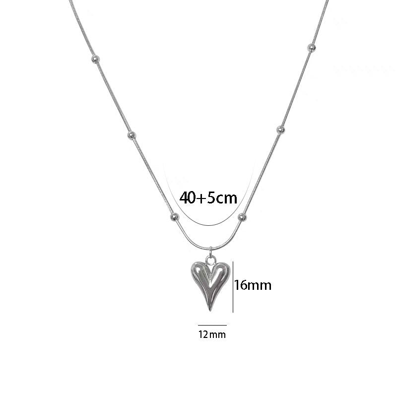 Collana con ciondolo a cuore in acciaio al titanio stile principessa con finitura placcata per donna, catena a serpente minimalista girocollo