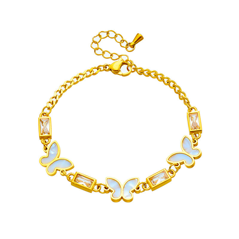 Pulsera minimalista de acero de titanio con forma de mariposa, incrustaciones de pedrería y acabado chapado para mujer