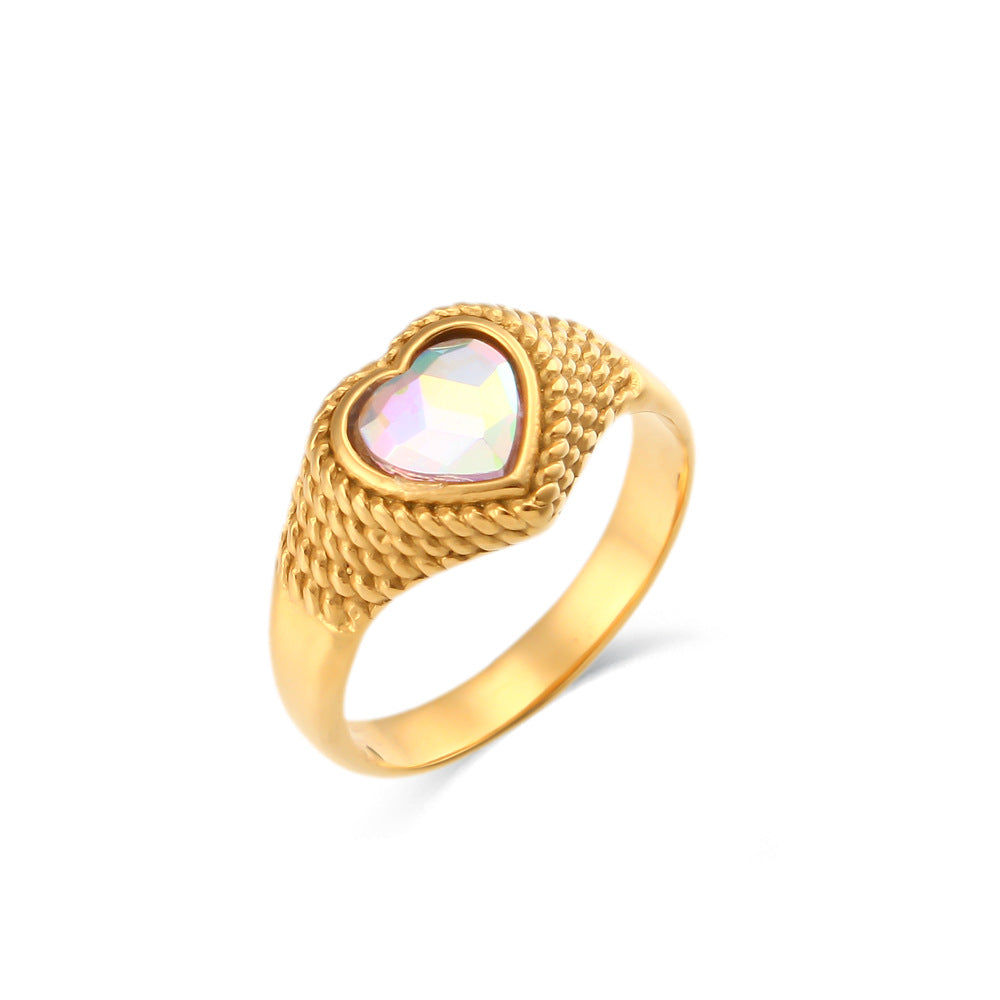Anillo de acero inoxidable con forma de corazón estilo lujo, baño de oro de 18K y diseño trenzado.