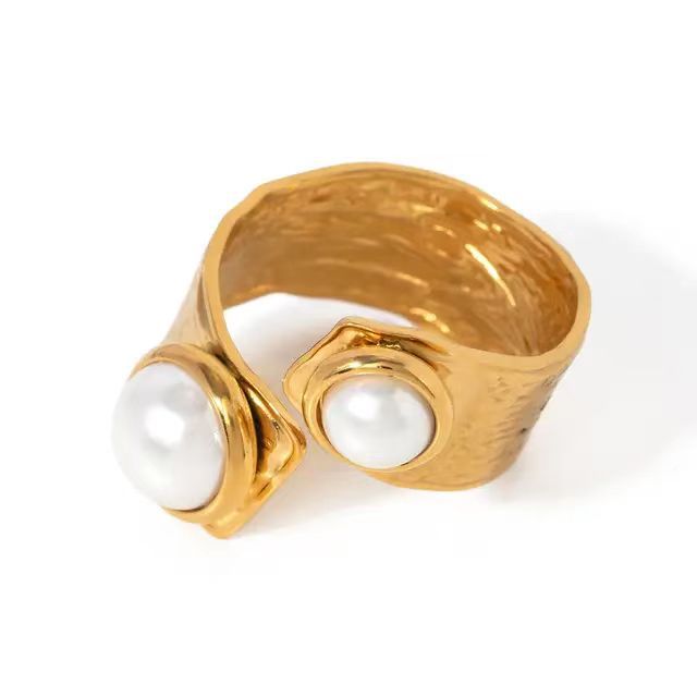 Anillo de acero inoxidable con diseño geométrico minimalista de lujo, incrustación de perlas y acabado chapado para mujer