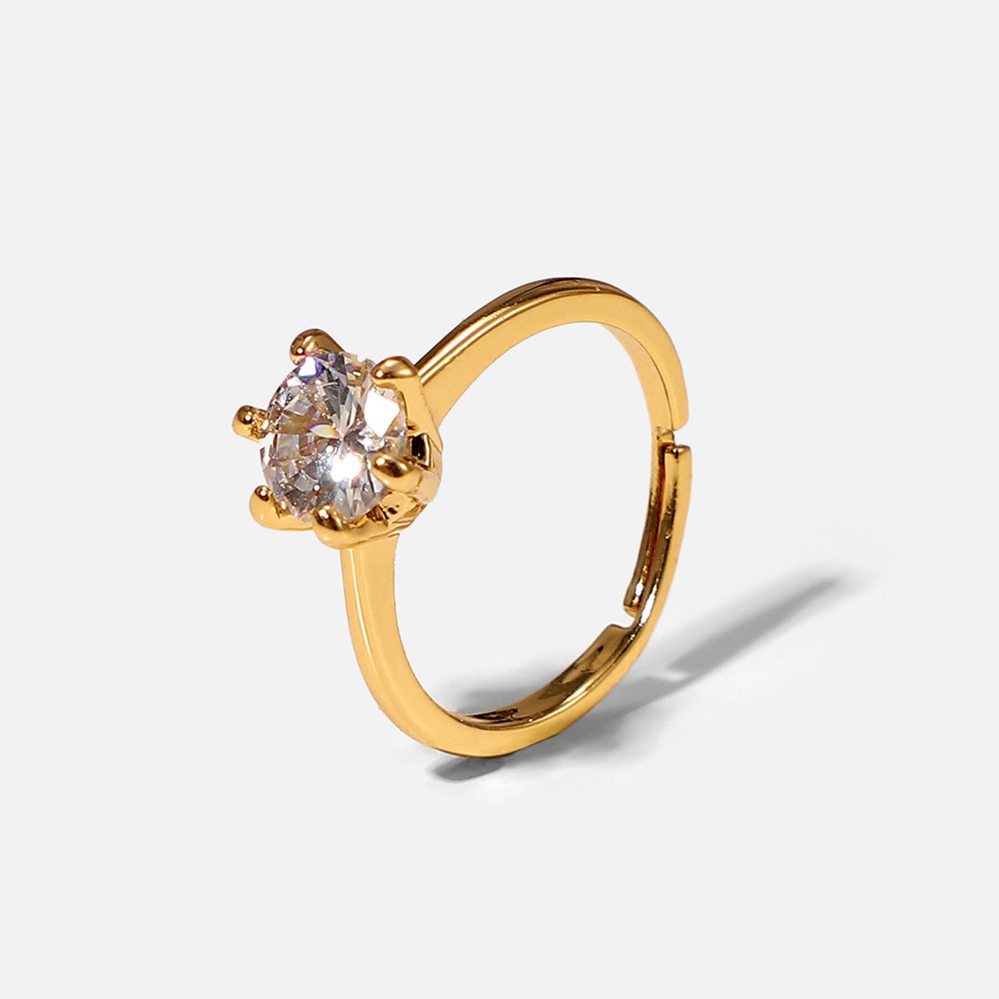 Anello rotondo con zircone bianco a sei griffe in stile cartone animato, in rame placcato oro 18 carati da donna