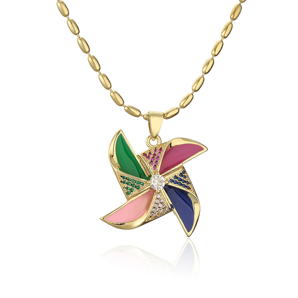 Collana con pendente a forma di fiore di mulino a vento geometrico irregolare minimalista da donna in rame con accenti di strass
