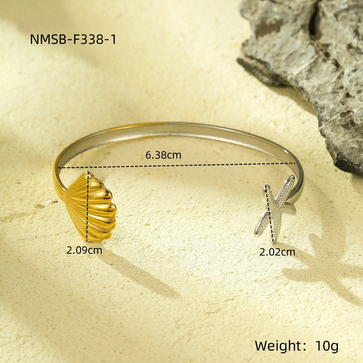 Juego de pulsera y anillo abierto de acero titanio minimalista, inspirado en el océano, con diseño de estrella de mar y vieira con baño de oro.
