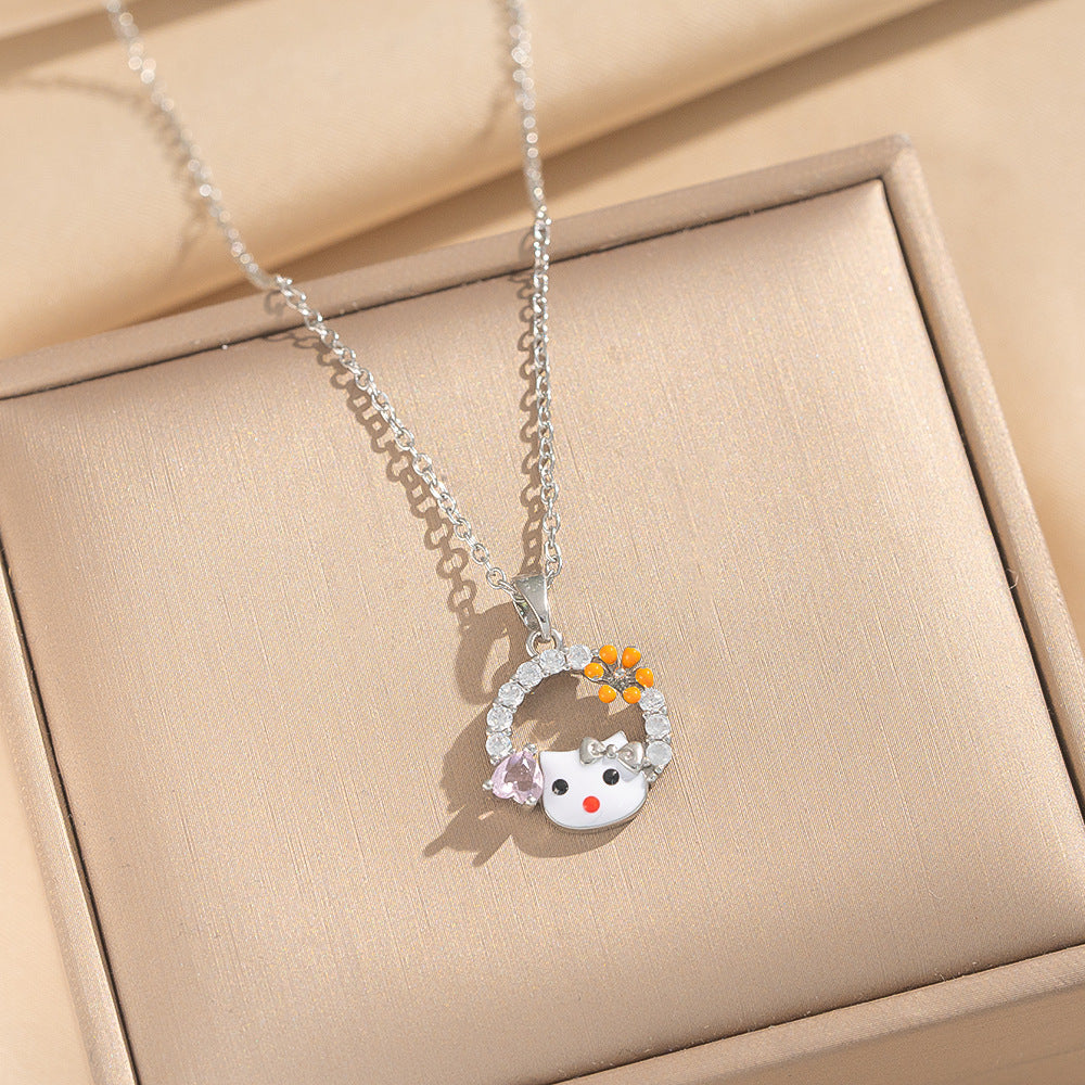 Collana con ciondolo dolce e carino a forma di gattino in acciaio al titanio placcato oro, con fiocco e design a fumetto, motivo a cuore, catena a O per donne