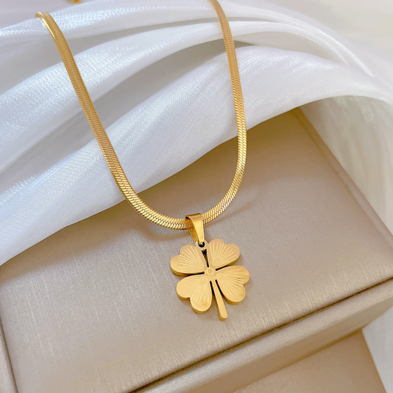 Collana a catena con ciondolo a quadrifoglio in acciaio al titanio, stile minimalista, placcata oro, per donna e uomo