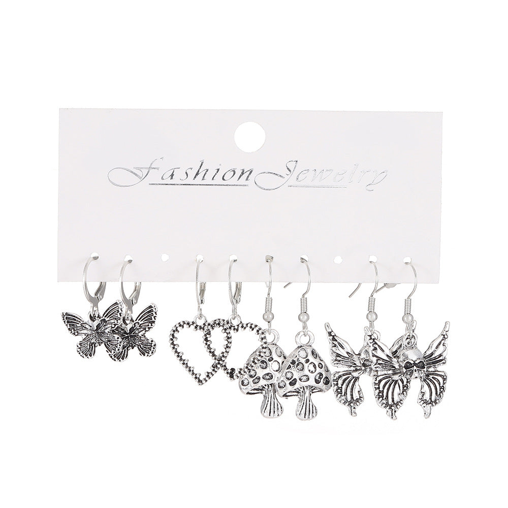 Juego de pendientes grandes con temática de Halloween, diseño geométrico de aleación bañada en plata con motivos de calaveras, calabazas y arañas para mujer