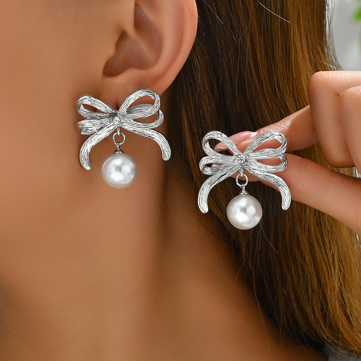 Minimalist Bow-Shaped Alloy Earrings with Pearl Inlay for Women Stainless Steel Post Elegant Everyday Wear