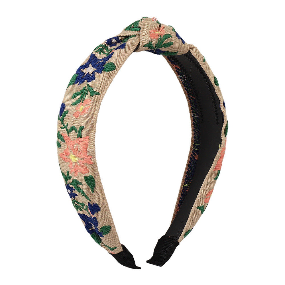 Diadema minimalista de tela para mujer con motivo floral y de hojas bordado