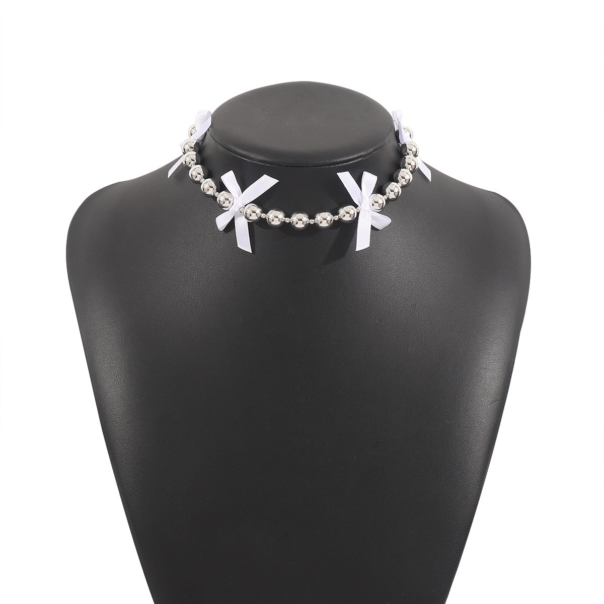 Collana pendente con fiocco dolce e audace per donna con lega e perle simulate su delicata catena a clavicola