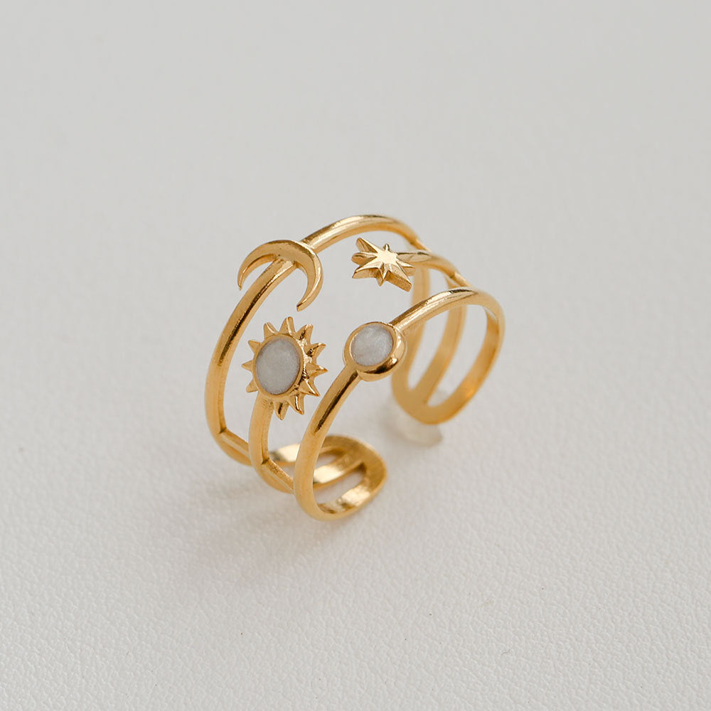 Anillo minimalista de acero de titanio con forma de girasol para mujer, con banda abierta ajustable y acabado chapado en oro