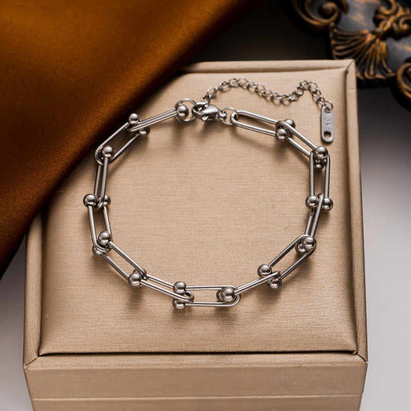 Bracciale a U Minimalista in Acciaio al Titanio con Finitura Placcata da Donna, Accessorio di Moda Ipoallergenico
