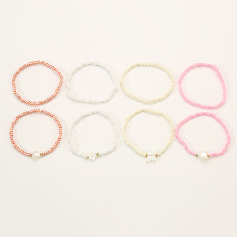 Braccialetto artigianale in stile bohémien con perline per bambini con ciondoli a forma di stella e cuore, perline di vetro colorate