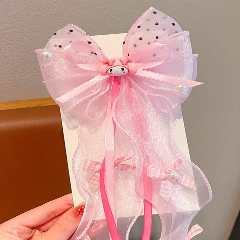 Handmade Chinese Traditional Hair Clip for Girls with Bow Shape Fabric Material and Flowing Tassels in Natural Style