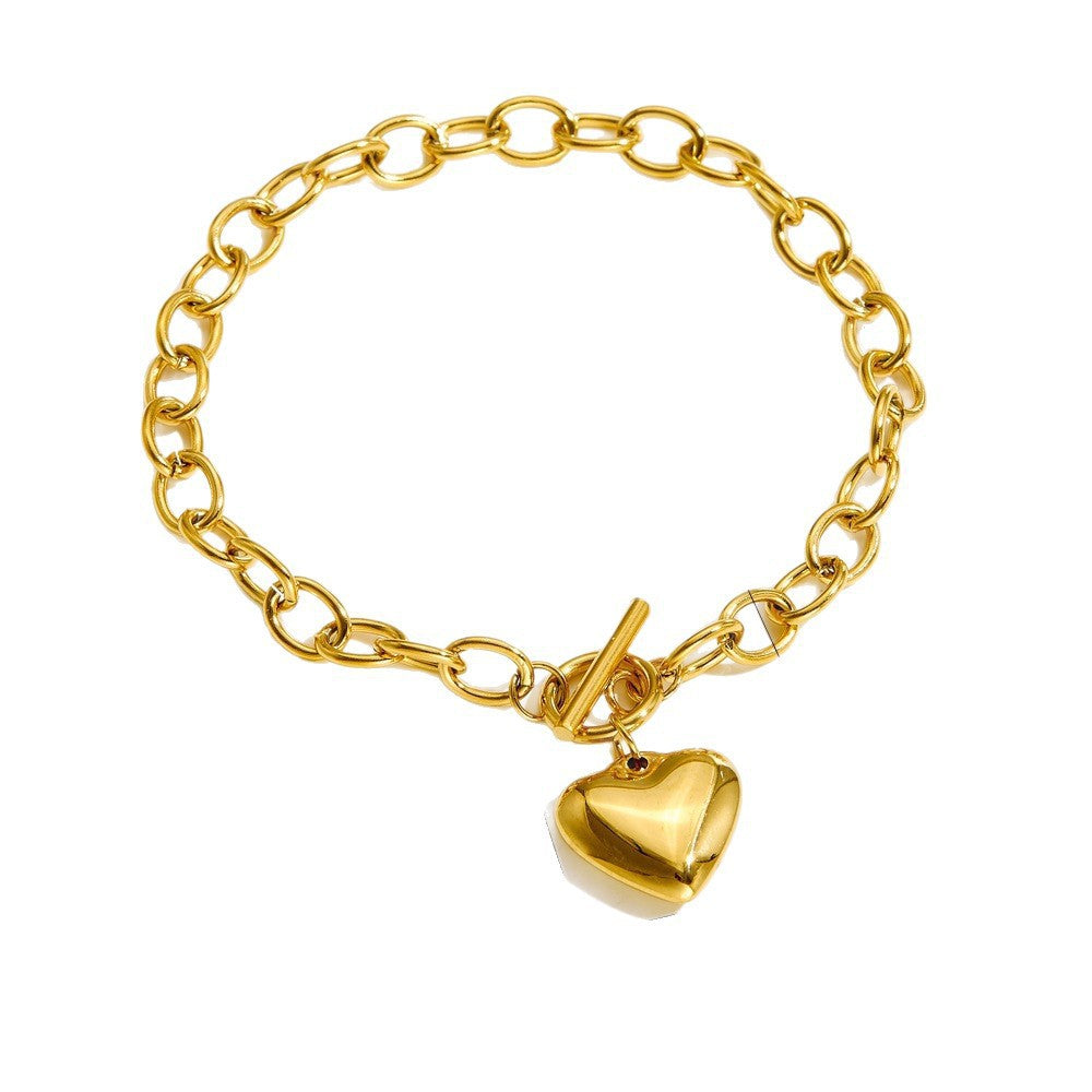Elegante pulsera de acero inoxidable con forma de corazón para mujer con acabado chapado en oro de 18 quilates y cierre de palanca