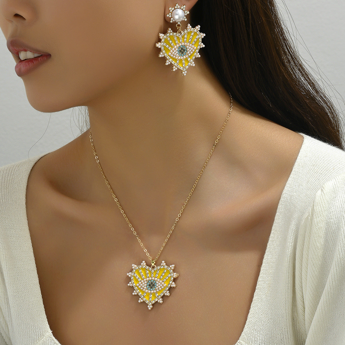 Parure di collana con pendente a occhio turco e orecchini a perno con intarsio di strass per donna, design a cuore e a goccia in lega, stile hip hop retrò