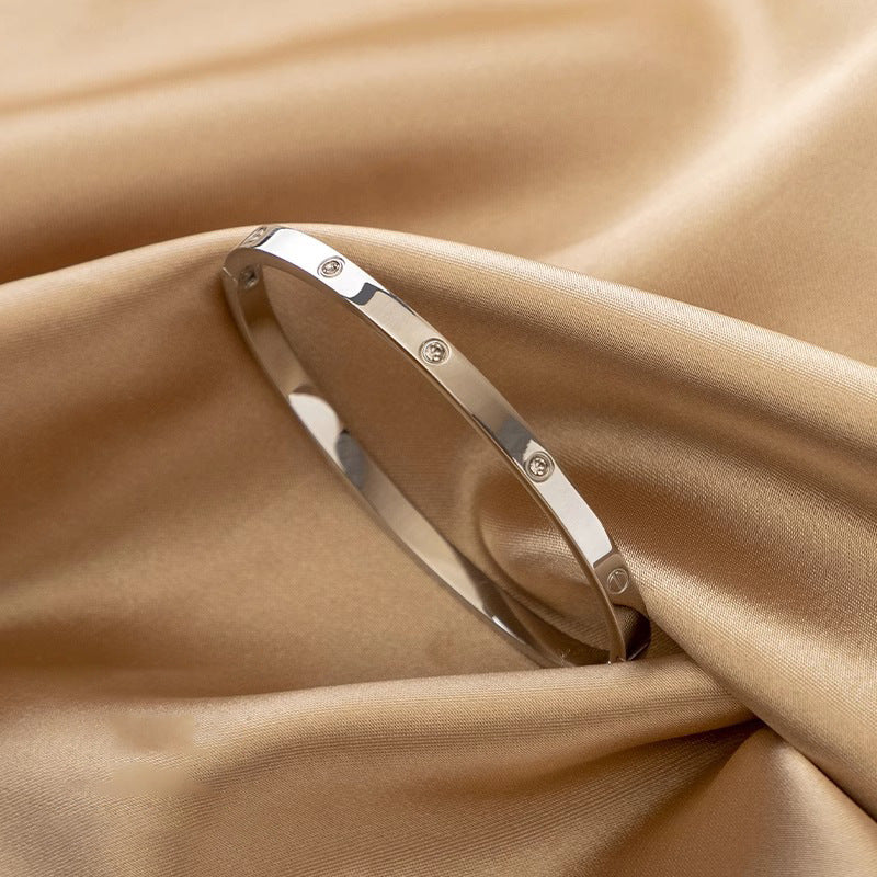 Minimalist Elliptical Titanium Steel Bracelet with Plating Finish for Women Elegant Lightweight Luxury Bangle