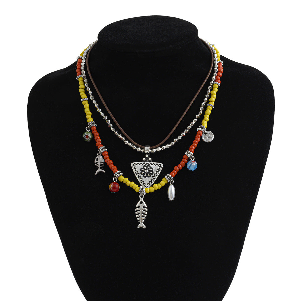 Collana pendente bohémien floreale e geometrica da donna in lega con finitura placcata, nappe e strati di perline