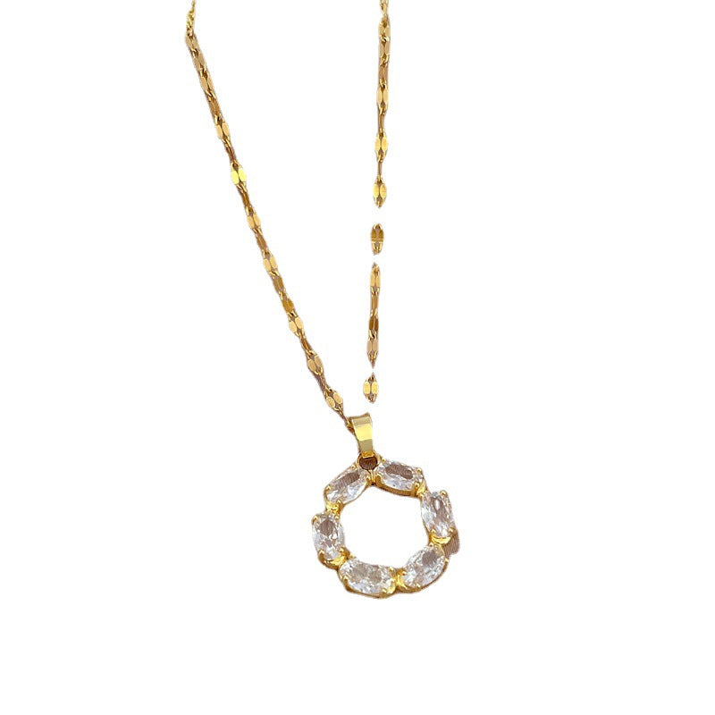 Collana Pendente Minimalista da Donna in Acciaio al Titanio con Forma ad Anello Geometrico e Intarsio di Zirconi