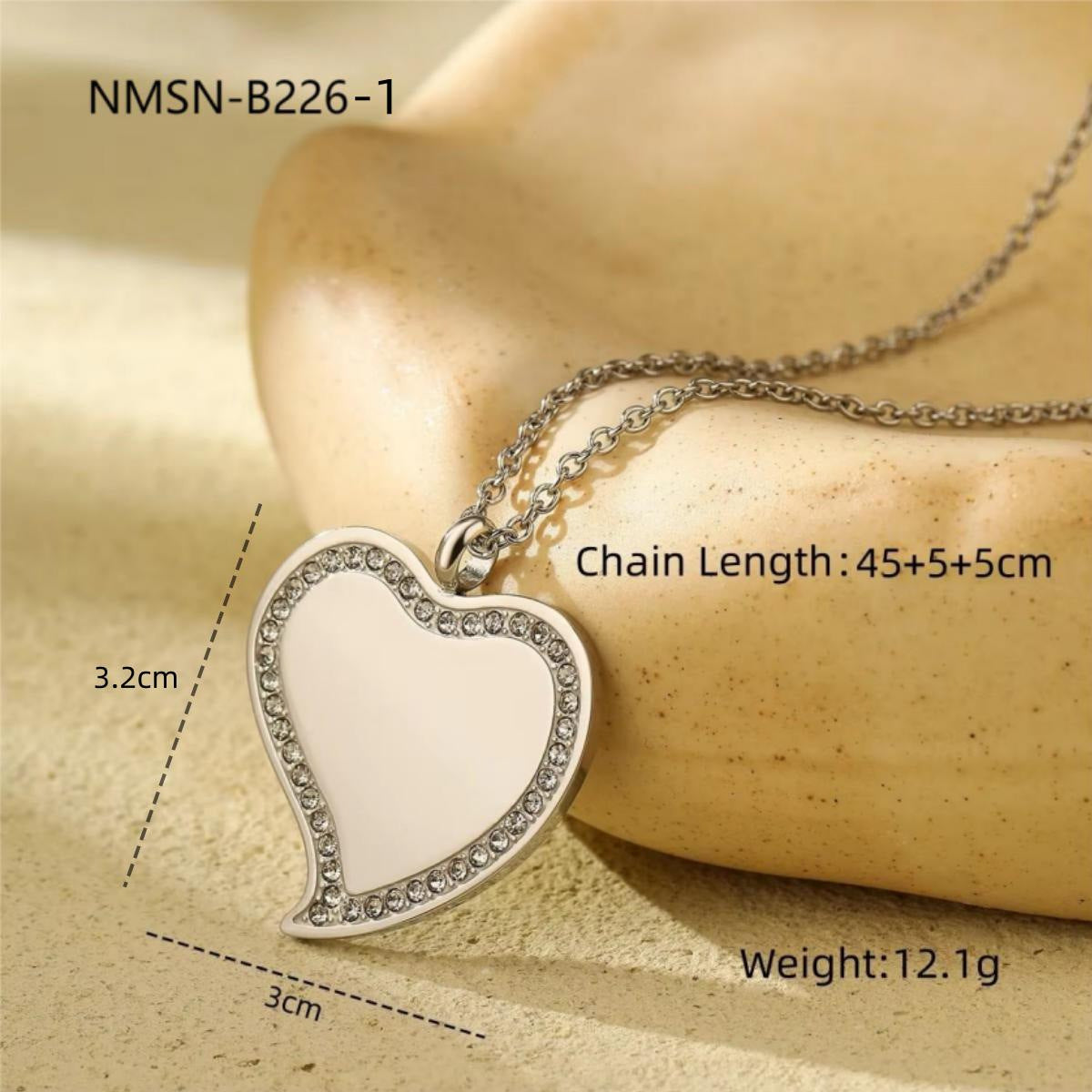 Collana da donna con pendente a cuore minimalista in acciaio inossidabile e strass intarsiati