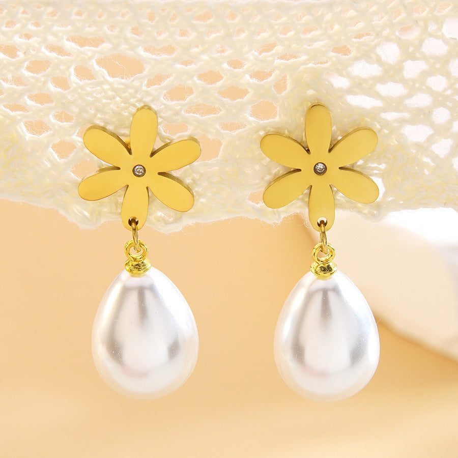 Orecchini placcati in acciaio inossidabile con fiore geometrico ed elegante fiocco, pendente con perla, stile vintage