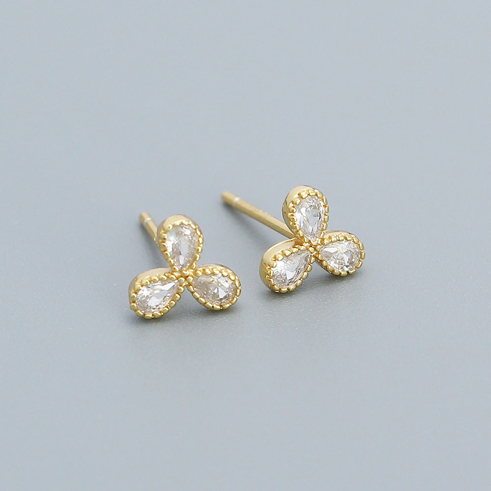 Orecchini a perno con intarsio floreale in argento sterling 925 e zirconi cubici