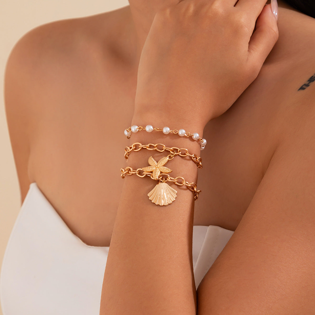 Collana con ciondolo a stella in lega di zinco impilabile con nappa e catena irregolare da donna