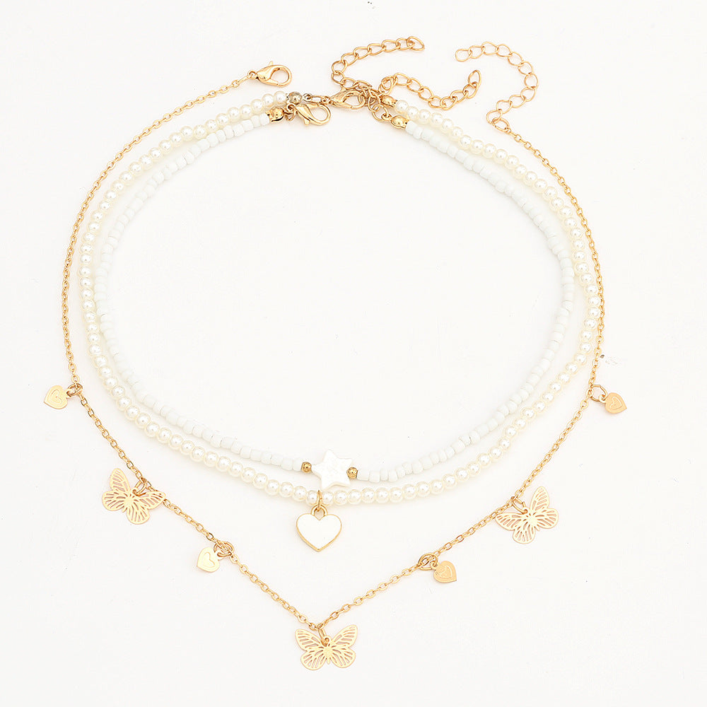Set di collane con ciondoli a forma di cuore, farfalla e stella, da bambina, con ciondolo in lega e catena di perle in stile principessa