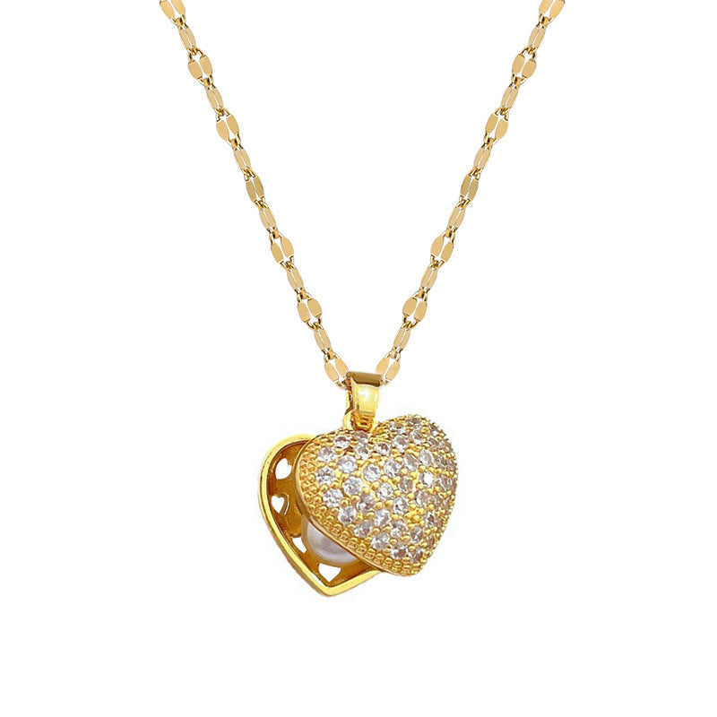 Elegante collana di lusso in acciaio al titanio a forma di cuore con ciondolo a perla e conchiglia su catena ondulata per donna