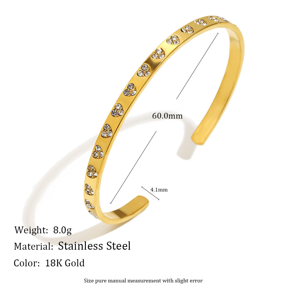 Pulsera de acero inoxidable con corazón hueco de estilo francés minimalista, chapado en oro de 18 quilates y líneas de acento de circonita