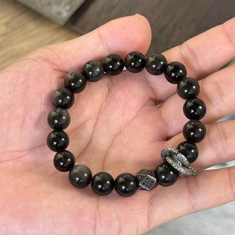 Bracciale Geometrico con Perline di Ossidiana Nera, Montatura in Rame e Accenti di Zirconi, Accessorio Moda Unisex per Donna e Uomo
