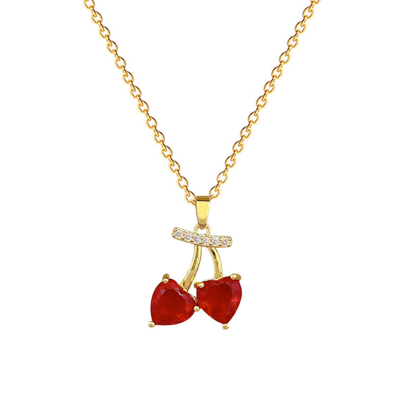 Collar de acero inoxidable con forma de cereza de dibujos animados con incrustaciones de diamantes de imitación para mujeres y hombres, delicada cadena de clavícula