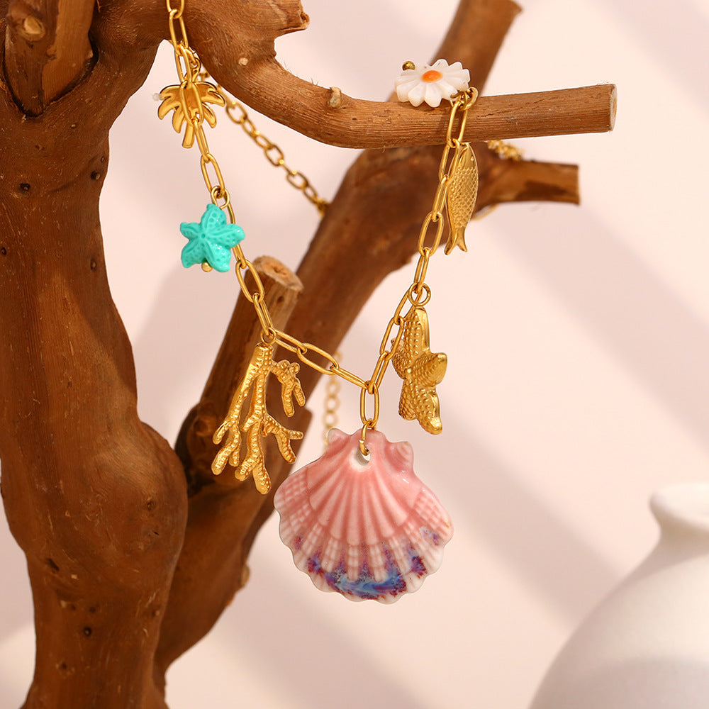 Collana con ciondolo a conchiglia alla moda in acciaio inossidabile placcato oro 18 carati da donna