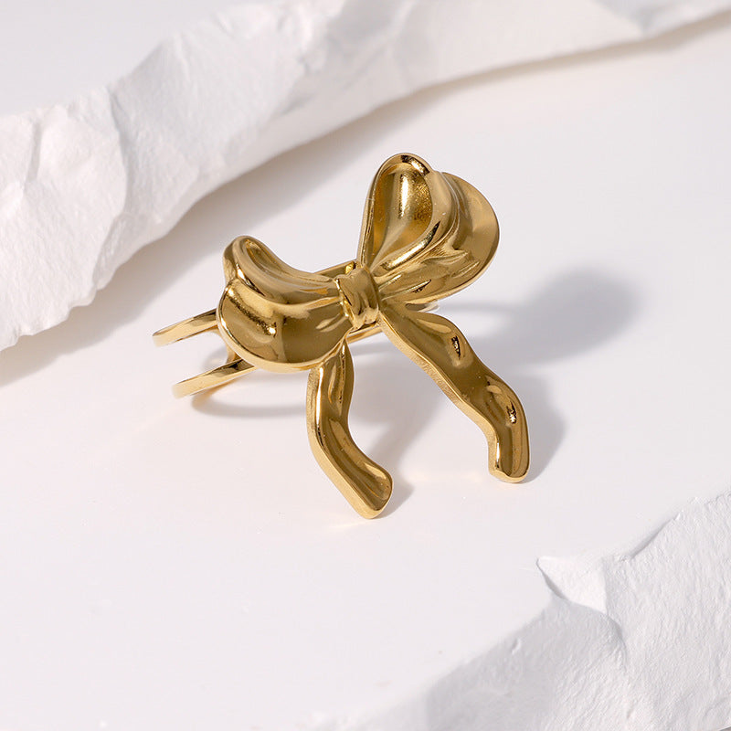 Anello da donna minimalista dolce a forma di fiocco in acciaio inossidabile con finitura placcata, fascia aperta regolabile