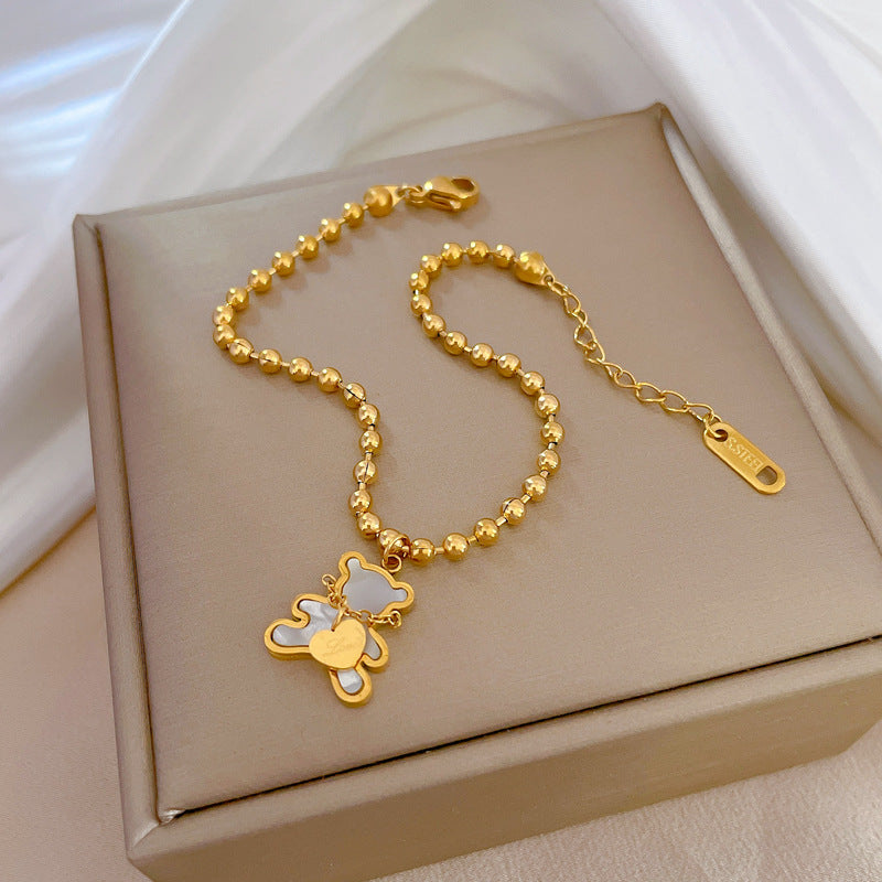 Minimalist Vintage Heart Bear Shell Bracelet for Women and Men Titanium Steel Box Chain with Gold Plating Wavy Bean Pattern