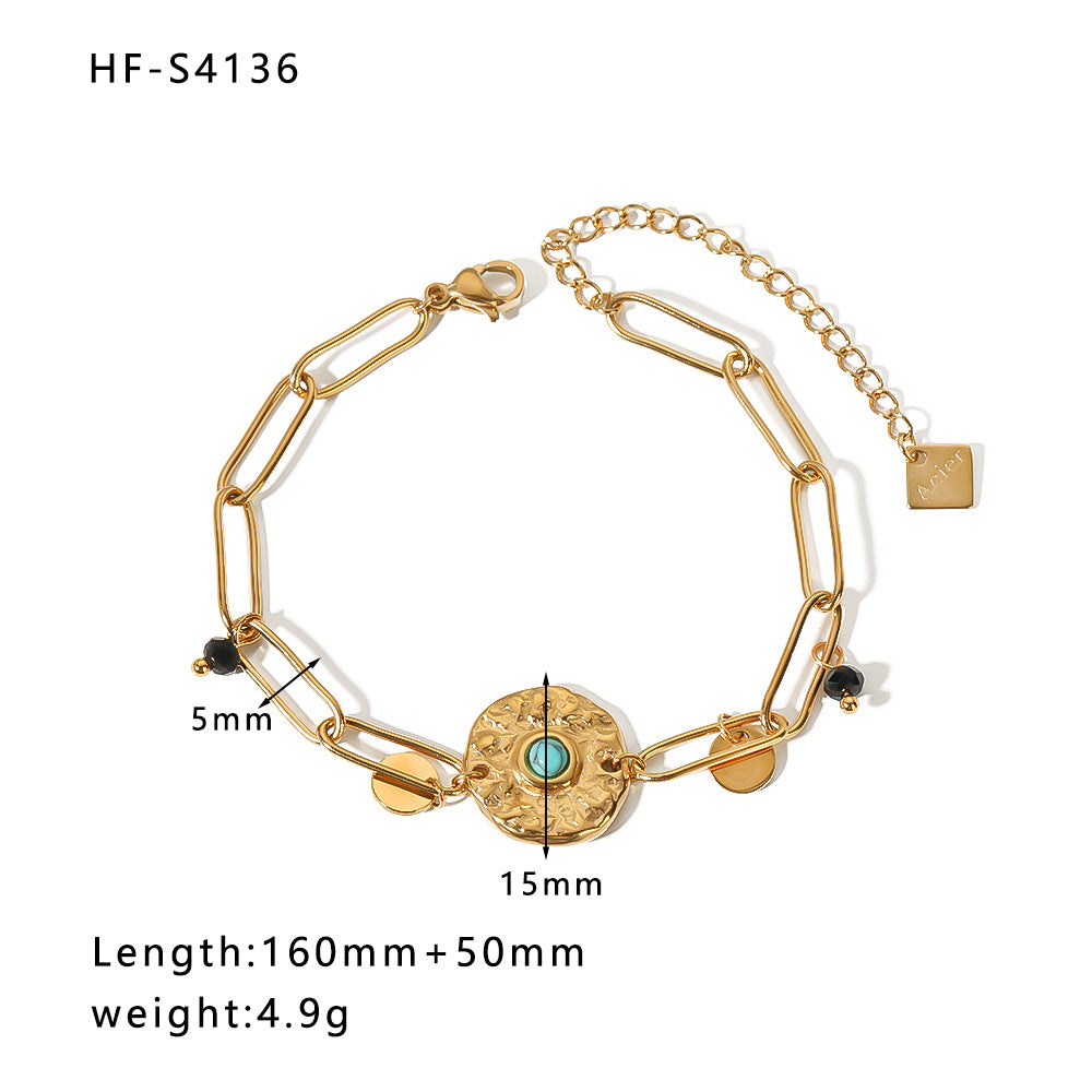 Bracciale vintage con farfalla e ciondolo rotondo in acciaio inossidabile con intarsio di strass e dettagli in perle