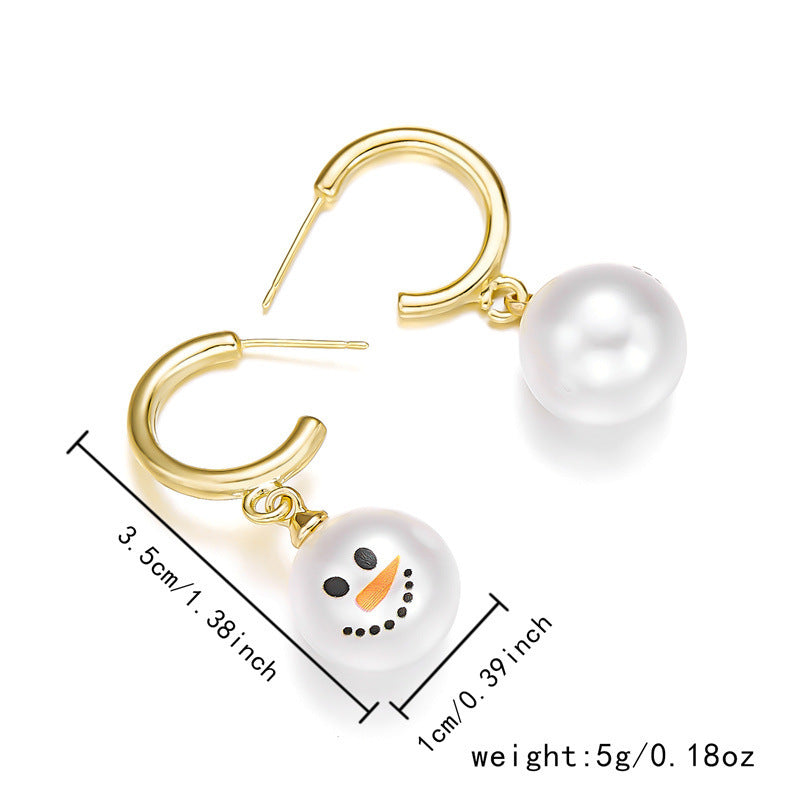 Pendientes de perla con diseño de copo de nieve y temática navideña para mujer, con incrustaciones de diamantes de imitación y diseño geométrico en aleación con acabado de baño.