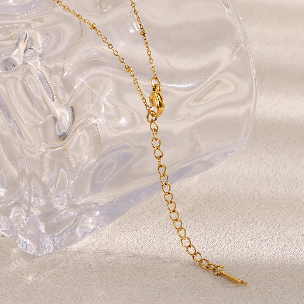 Vintage Floral Pendant Necklace for Women Made of Stainless Steel with 18K Gold Plating and Zircon Accents