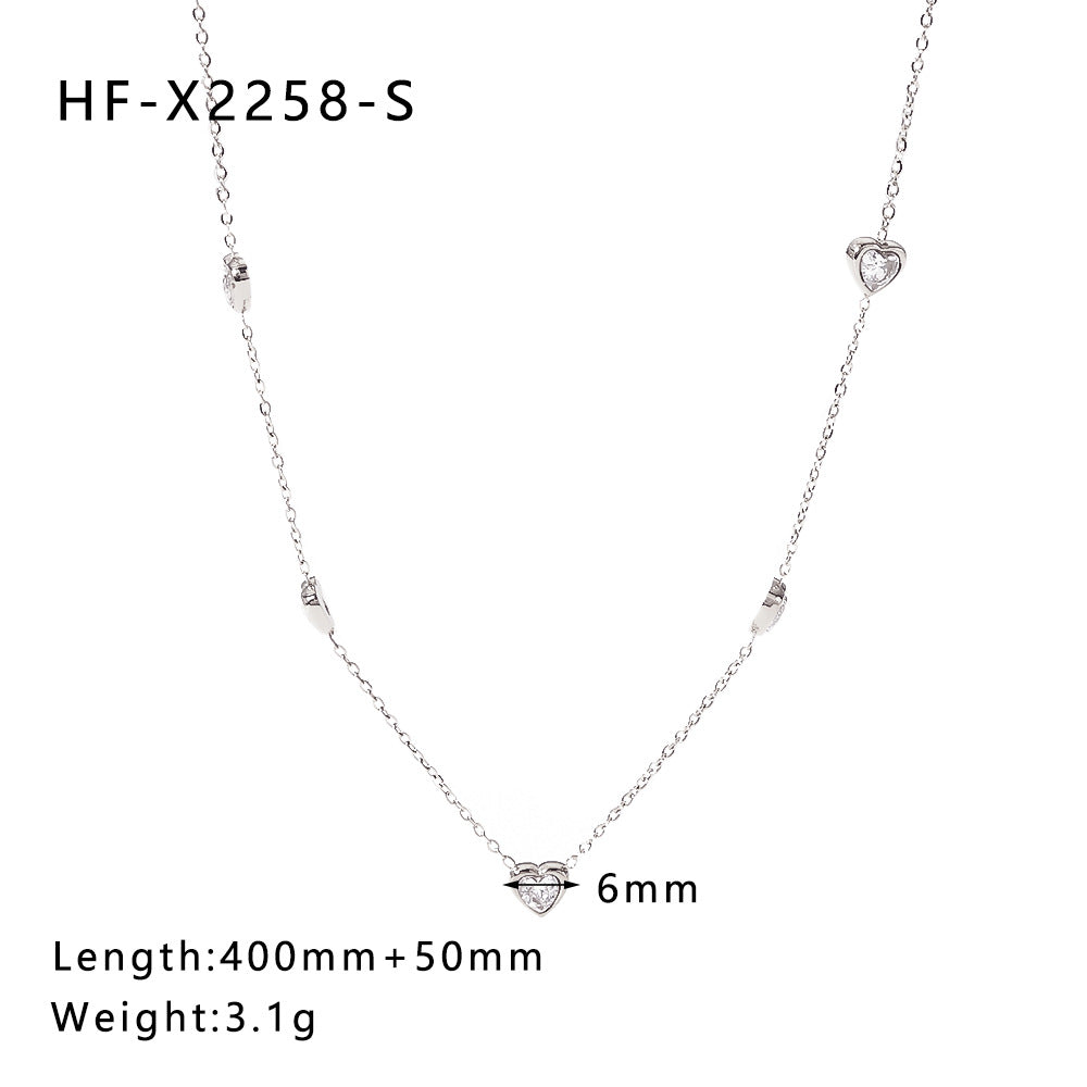 Collana da donna in acciaio inossidabile a forma di cuore stile INS con ciondolo in acciaio al titanio placcato oro 18 carati e intarsio in zirconi