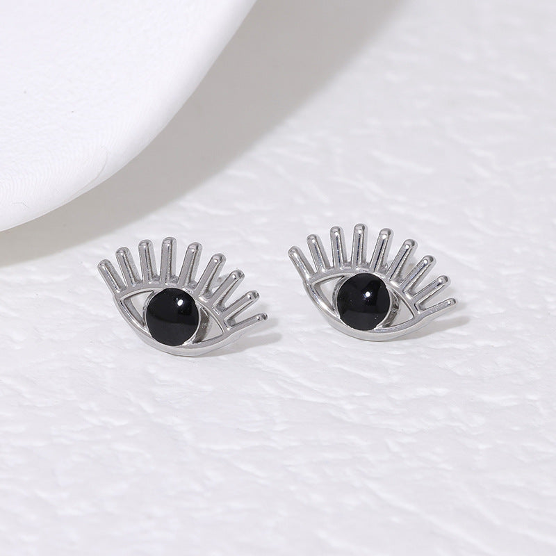 Pendientes de botón con forma de ojo de demonio atrevido de acero de titanio con chapado en oro de 18 quilates para mujer