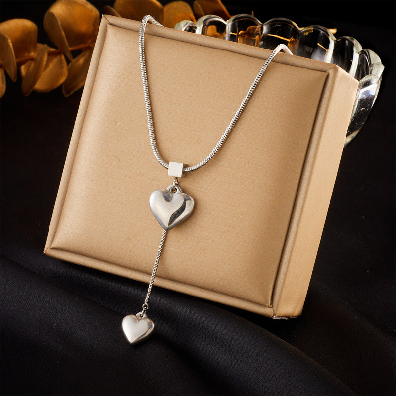 Collana con ciondolo a cuore placcato in acciaio inossidabile, elegante e minimalista, con catena a scatola