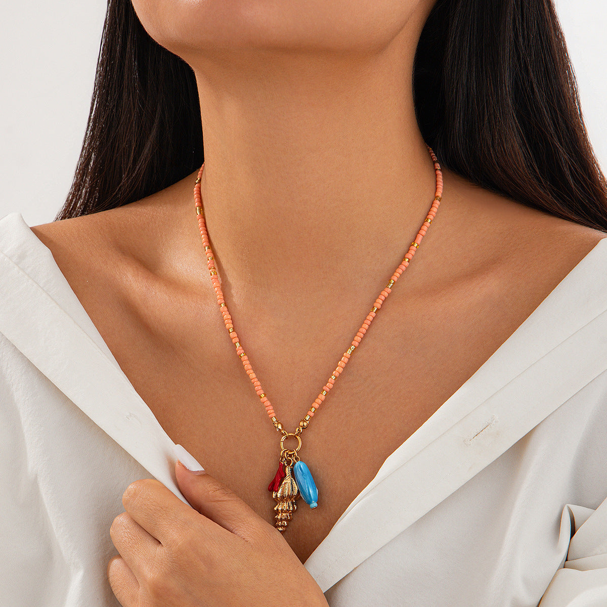 Collana Minimalista con Conchiglia e Pesce Ispirata all'Oceano con Ciondolo Occhio Mano di Buddha in Lega e Acrilico con Finitura Placcata per Donna