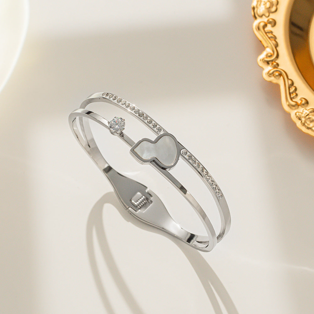 Bracciale minimalista "Zucca fortunata" da donna in acciaio al titanio placcato oro 18K con intarsio in madreperla