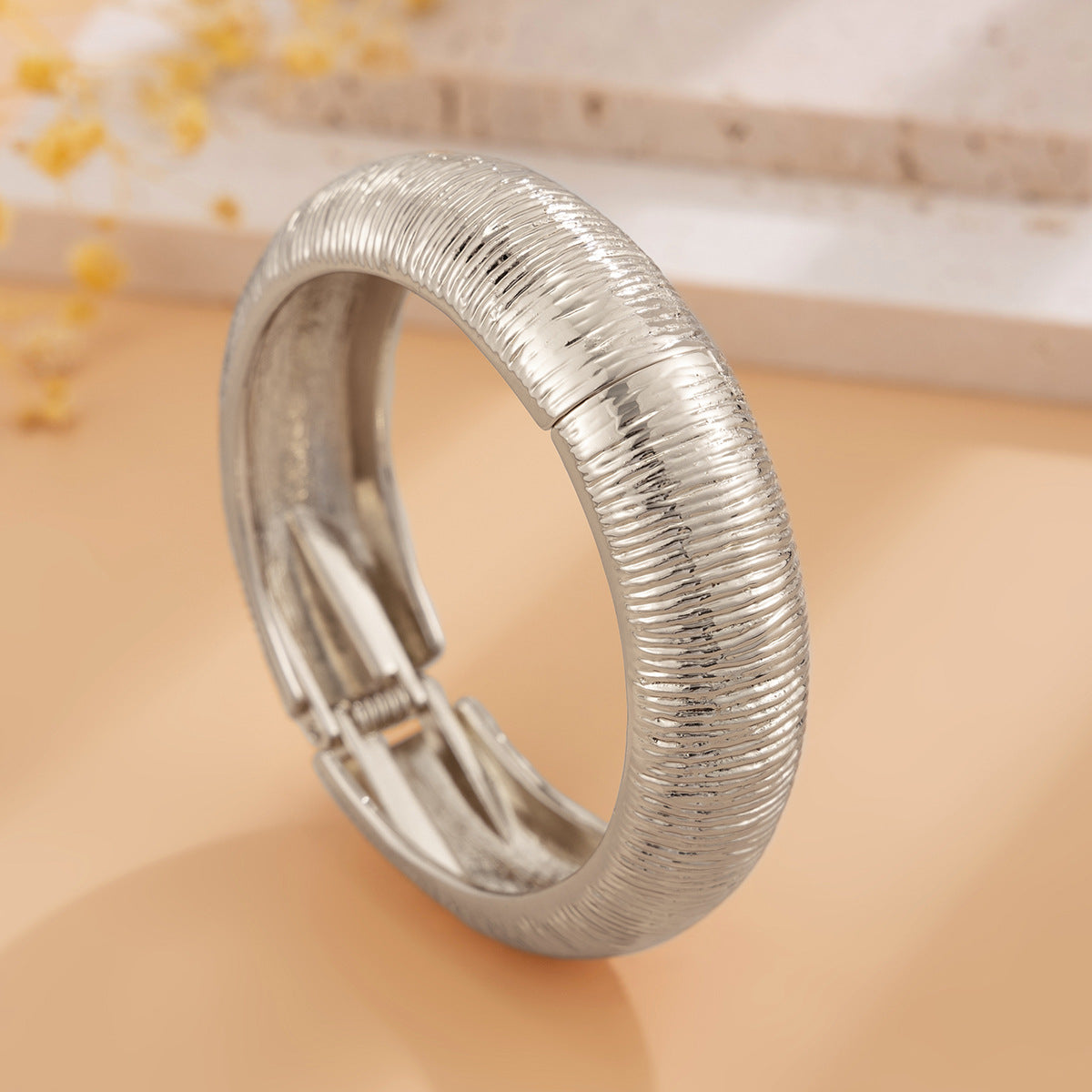 Exaggerated Geometric Bracelet in Alloy with Polished Spring Texture and Futuristic Minimalist Design