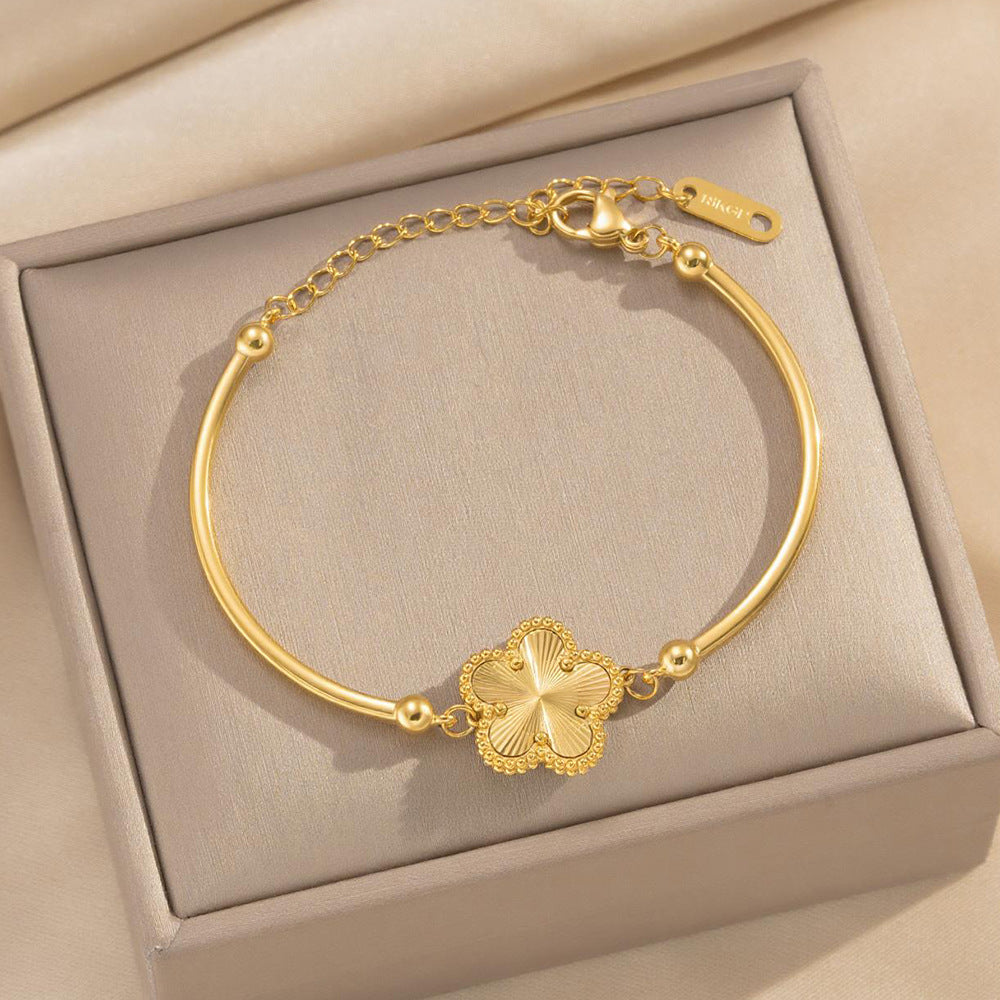 Luxury Elegant Gold Plated Floral Titanium Steel Bracelet for Women and Men